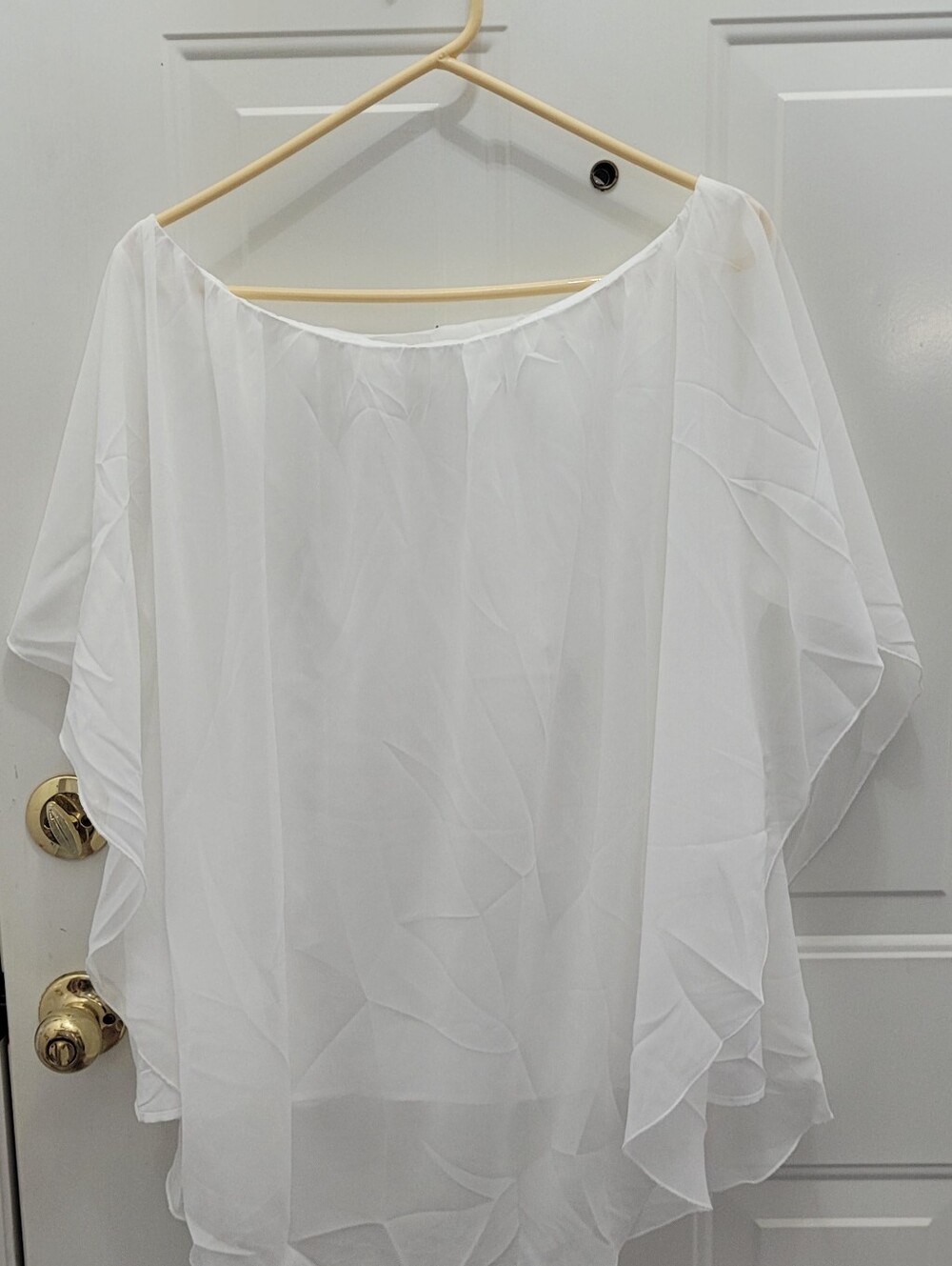 NWOT. 2XL.White Sheer Polyester Chiffon Ruffle with an attached tank underneath.